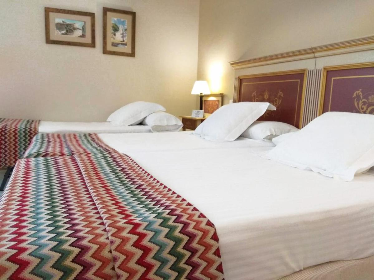 Hotel Alcazar De La Reina Кармона Экстерьер фото