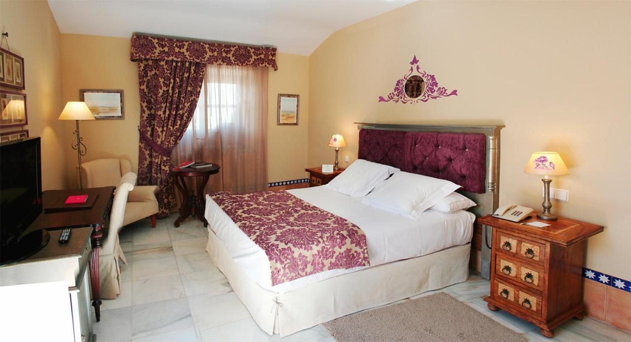 Hotel Alcazar De La Reina Кармона Экстерьер фото